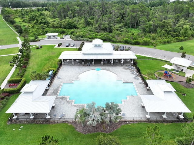 10347 Heron Hideaway Loop, Land O Lakes, FL 34638 - view of subject property featuring a pool and a heavily wooded area