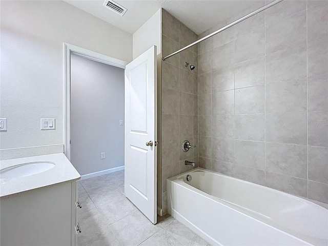 10347 Heron Hideaway Loop, Land O Lakes, FL 34638 - bathroom featuring  shower combination, tile patterned floors, and vanity
