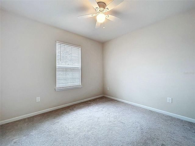 10347 Heron Hideaway Loop, Land O Lakes, FL 34638 - carpeted empty room with baseboards and ceiling fan