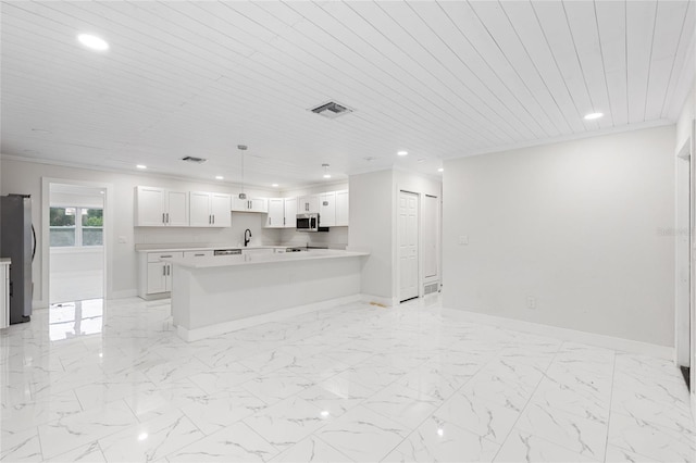 3552 Middletown St, Port Charlotte, FL 33952 - kitchen with stainless steel appliances, recessed lighting, a sink, light countertops, and baseboards
