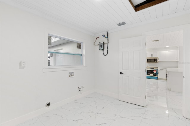 3552 Middletown St, Port Charlotte, FL 33952 - empty room with light marble finish flooring, baseboards, and wood ceiling