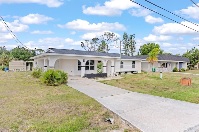 3552 Middletown St, Port Charlotte, FL 33952 - ranch-style house with concrete driveway, a front lawn, and stucco siding