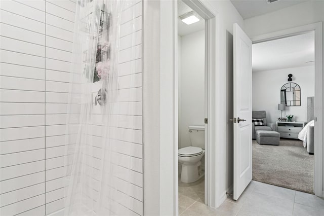 11693 Lavender Loop, Spring Hill, FL 34609 - full bath with a stall shower, ensuite bathroom, and tile patterned floors