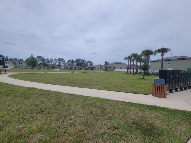 11693 Lavender Loop, Spring Hill, FL 34609 - view of property's community featuring mail area, a yard, and a residential view