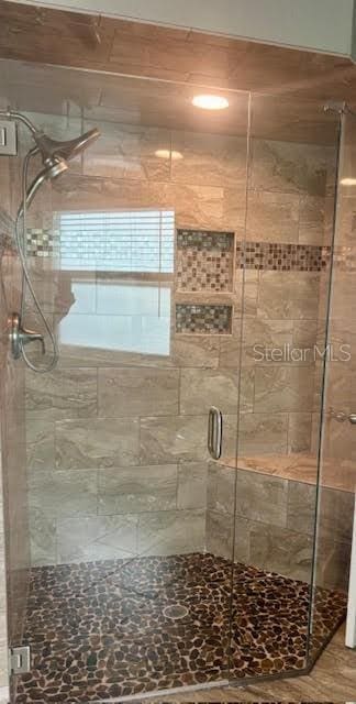 7144 Remington Oaks Loop, Lakeland, FL 33810 - bathroom with a shower stall