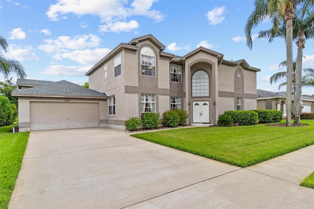 18219 Bittern Ave, Lutz, FL 33558 - view of front of home with driveway, stucco siding, a front yard, and a garage