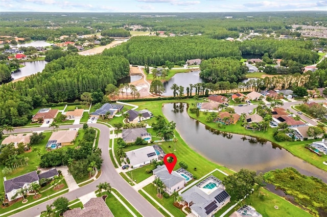 18219 Bittern Ave, Lutz, FL 33558 - aerial overview of property's location featuring a large body of water and nearby suburban area