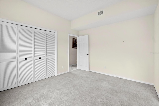 18219 Bittern Ave, Lutz, FL 33558 - unfurnished bedroom with carpet floors and a closet
