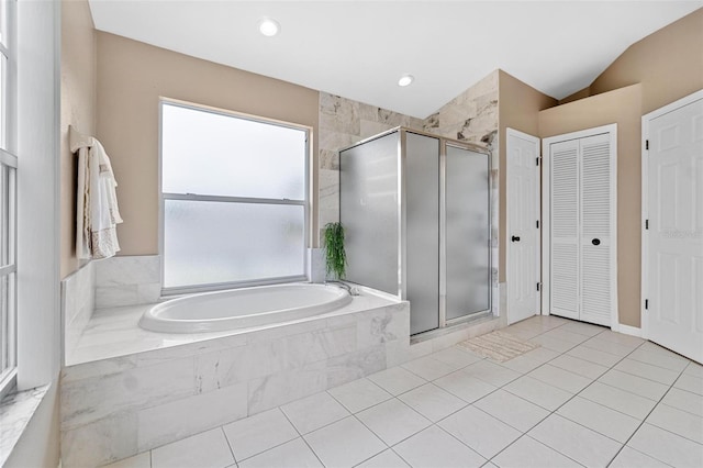 18219 Bittern Ave, Lutz, FL 33558 - bathroom with a closet, a bath, a stall shower, tile patterned floors, and recessed lighting