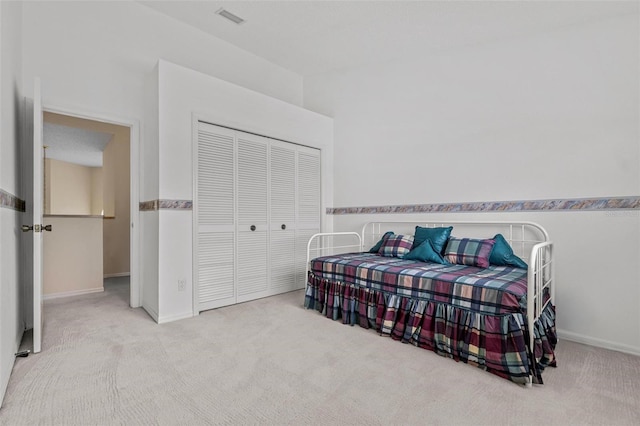 18219 Bittern Ave, Lutz, FL 33558 - carpeted bedroom with a closet and vaulted ceiling