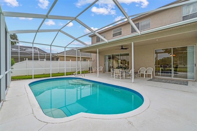 18219 Bittern Ave, Lutz, FL 33558 - view of pool featuring a patio, a lanai, ceiling fan, and outdoor dining area