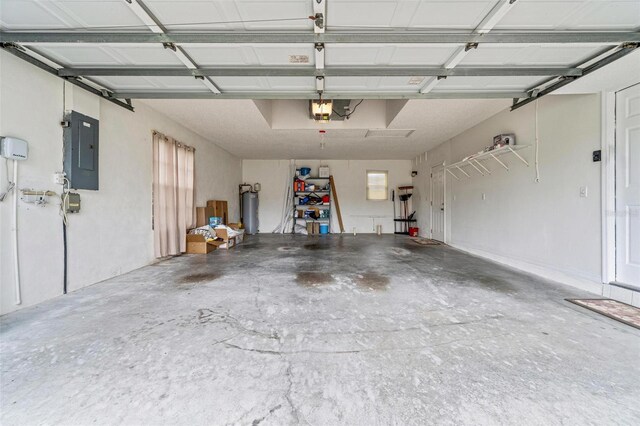 18219 Bittern Ave, Lutz, FL 33558 - garage with electric panel and a garage door opener