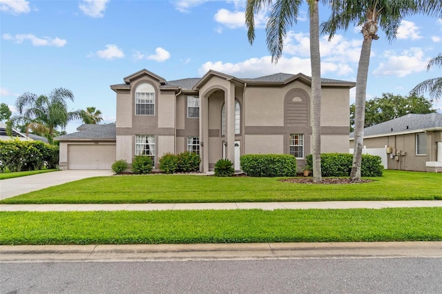 18219 Bittern Ave, Lutz, FL 33558 - traditional-style home featuring stucco siding, concrete driveway, a garage, and a front yard