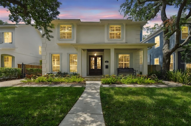 2522 W Watrous Ave, Tampa, FL 33629 - view of front facade featuring french doors and stucco siding