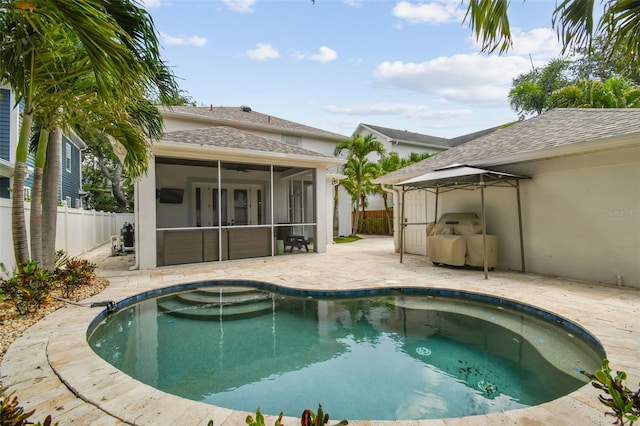 2522 W Watrous Ave, Tampa, FL 33629 - view of swimming pool featuring a sunroom, a fenced backyard, a jacuzzi, a patio, and a gazebo