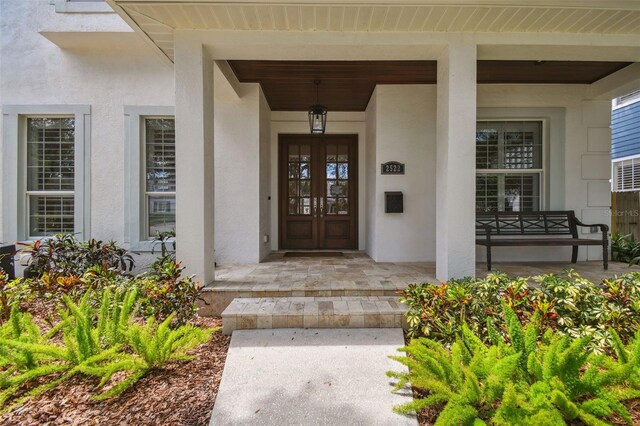 2522 W Watrous Ave, Tampa, FL 33629 - entrance to property featuring a porch and stucco siding