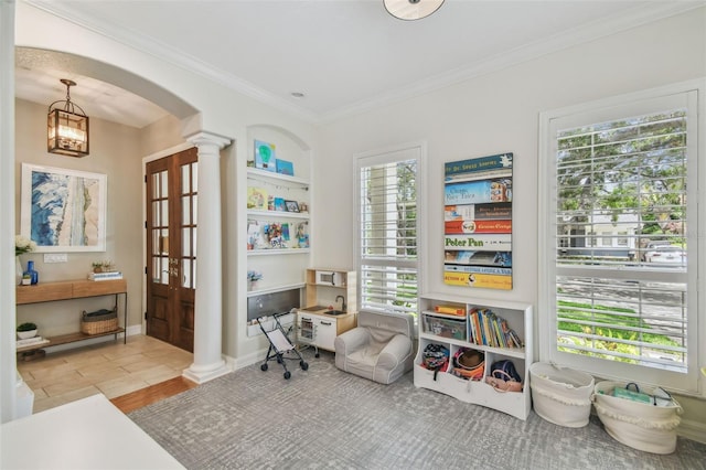 2522 W Watrous Ave, Tampa, FL 33629 - living area featuring decorative columns, arched walkways, and ornamental molding