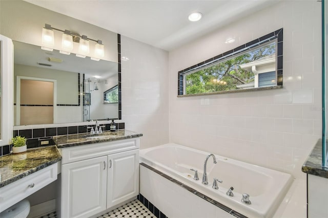 2522 W Watrous Ave, Tampa, FL 33629 - bathroom with vanity and a garden tub