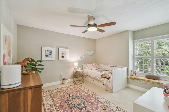 2522 W Watrous Ave, Tampa, FL 33629 - carpeted bedroom featuring baseboards and a ceiling fan