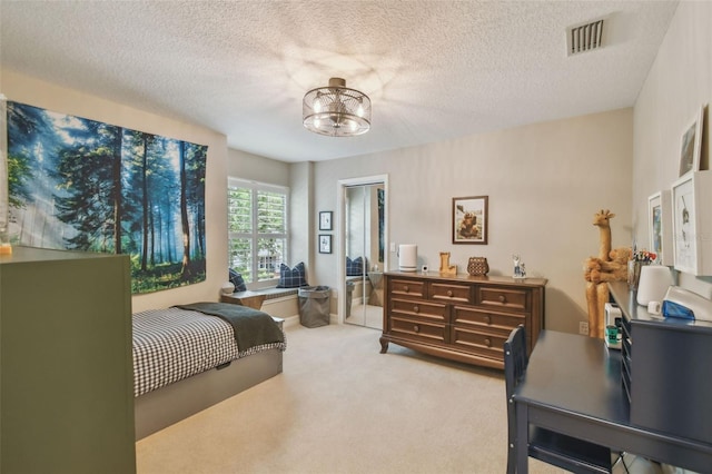 2522 W Watrous Ave, Tampa, FL 33629 - carpeted bedroom featuring a chandelier, an office area, and a textured ceiling