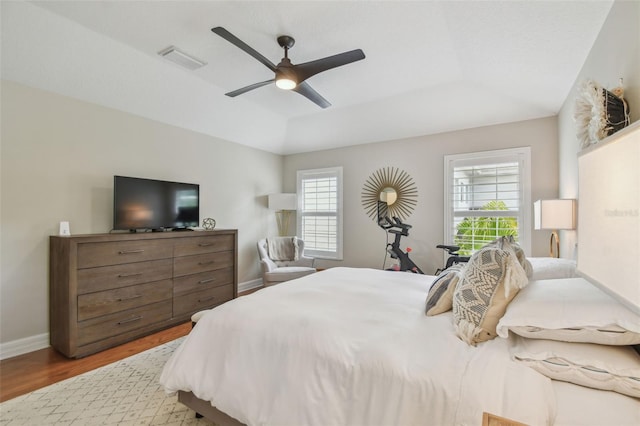 2522 W Watrous Ave, Tampa, FL 33629 - bedroom featuring wood finished floors, baseboards, and a ceiling fan