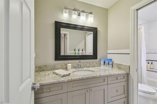 2522 W Watrous Ave, Tampa, FL 33629 - bathroom featuring vanity, toilet, and shower / bath combo