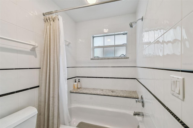 2522 W Watrous Ave, Tampa, FL 33629 - full bathroom with tile walls, toilet, and shower / bathtub combination with curtain