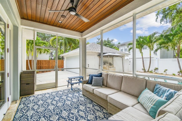 2522 W Watrous Ave, Tampa, FL 33629 - sunroom with an outdoor living space and a ceiling fan