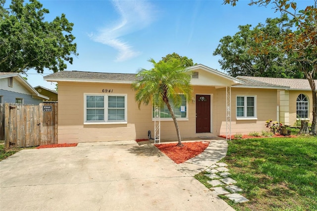 6941 58th Way N, Pinellas Park, FL 33781 - view of front facade featuring roof with shingles