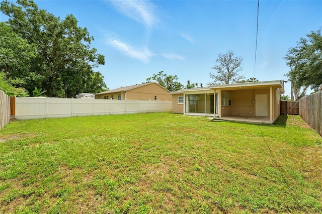 6941 58th Way N, Pinellas Park, FL 33781 - rear view of property featuring a patio