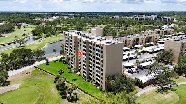 2616 Cove Cay Dr Unit 505, Clearwater, FL 33760 - bird's eye view of a golf course and a large body of water