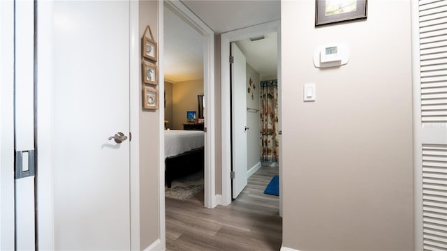 2616 Cove Cay Dr Unit 505, Clearwater, FL 33760 - hall featuring wood finished floors and baseboards