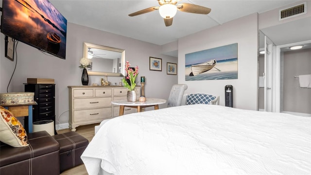 2616 Cove Cay Dr Unit 505, Clearwater, FL 33760 - bedroom with wood finished floors and ceiling fan