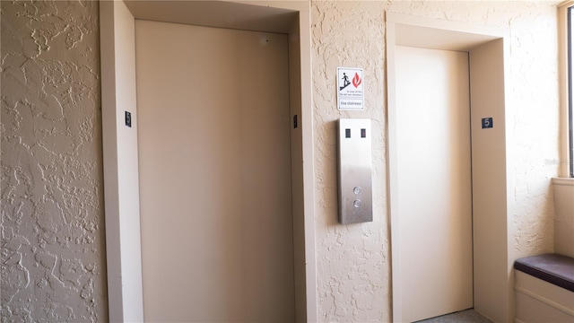 2616 Cove Cay Dr Unit 505, Clearwater, FL 33760 - elevator with a textured wall