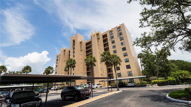 2616 Cove Cay Dr Unit 505, Clearwater, FL 33760 - view of apartment building / complex featuring covered parking