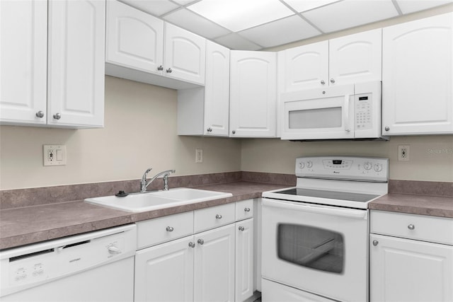 11805 Raintree Lake Ln Unit A, Tampa, FL 33617 - kitchen featuring white appliances, a sink, and white cabinetry