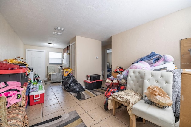 1799 Russell St S, Saint Petersburg, FL 33712 - interior space featuring light tile patterned floors and a textured ceiling