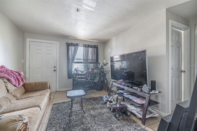 1799 Russell St S, Saint Petersburg, FL 33712 - tiled living area featuring a textured ceiling and a textured wall