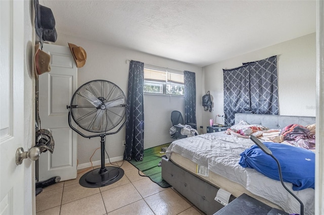 1799 Russell St S, Saint Petersburg, FL 33712 - bedroom with light tile patterned floors and a textured ceiling