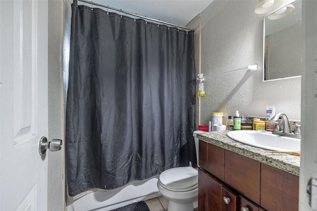 1799 Russell St S, Saint Petersburg, FL 33712 - full bathroom with a textured wall, vanity, shower / tub combo with curtain, and tile patterned flooring