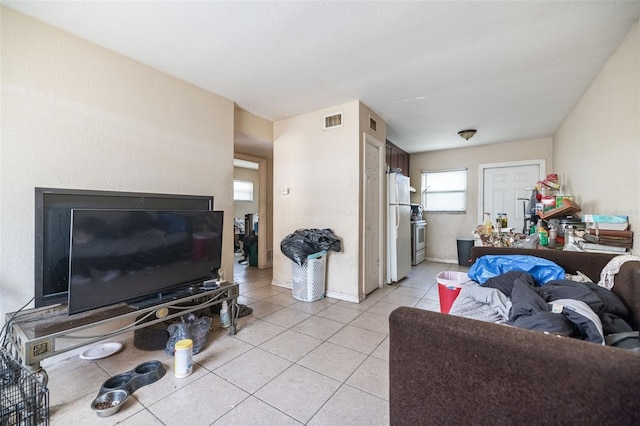 1799 Russell St S, Saint Petersburg, FL 33712 - living room featuring light tile patterned floors