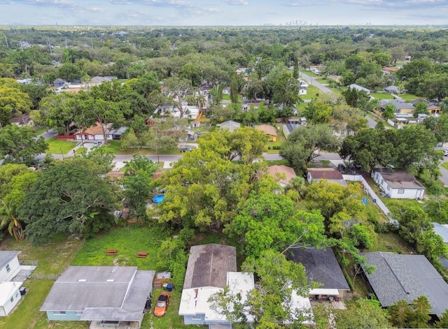 1807 E Bougainvillea Ave, Tampa, FL 33612 - aerial view of property and surrounding area featuring nearby suburban area