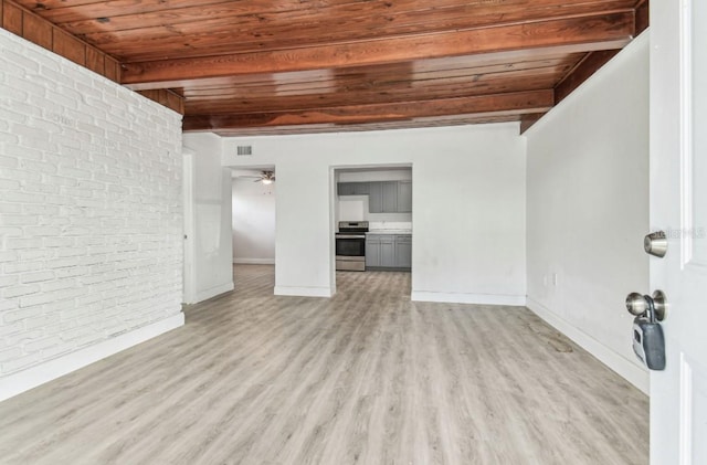1807 E Bougainvillea Ave, Tampa, FL 33612 - unfurnished living room featuring a wood ceiling with exposed beams, light wood-type flooring, brick wall, and a ceiling fan