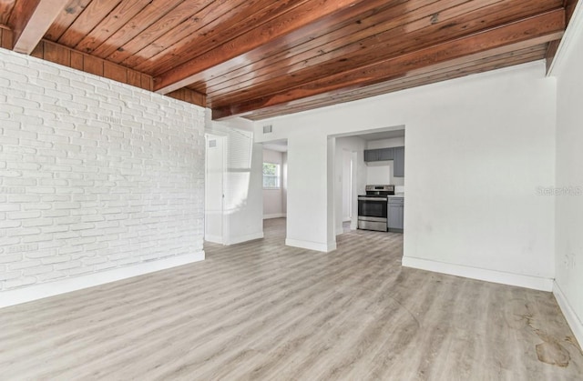 1807 E Bougainvillea Ave, Tampa, FL 33612 - empty room with a wood ceiling with exposed beams, brick wall, and light wood-style flooring