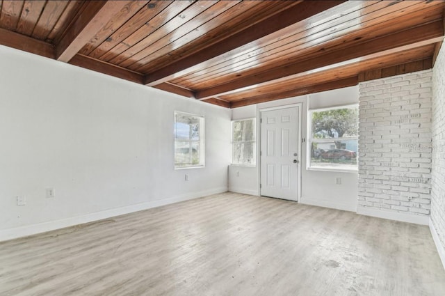 1807 E Bougainvillea Ave, Tampa, FL 33612 - spare room featuring a wooden ceiling with exposed beams and wood finished floors