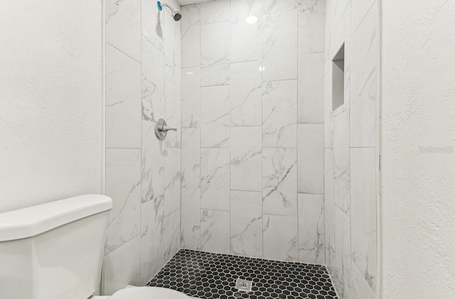 1807 E Bougainvillea Ave, Tampa, FL 33612 - bathroom featuring toilet and a stall shower