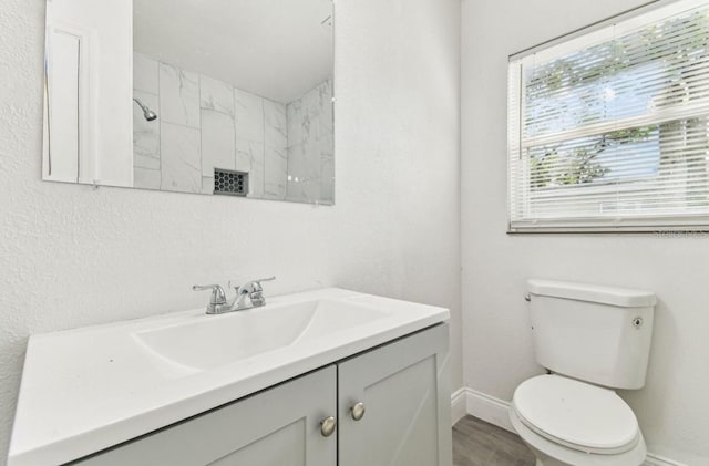 1807 E Bougainvillea Ave, Tampa, FL 33612 - bathroom with vanity and toilet