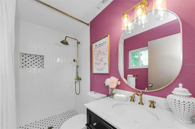1558 Cottonwood Ter, Dunedin, FL 34698 - bathroom featuring a tile shower, vanity, and toilet