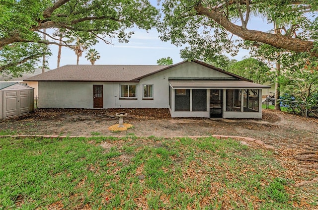 1558 Cottonwood Ter, Dunedin, FL 34698 - back of property featuring a sunroom