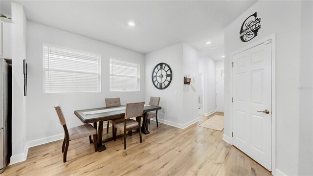 5645 Del Coronado Dr, Apollo Beach, FL 33572 - dining space featuring light wood-style flooring, recessed lighting, and baseboards